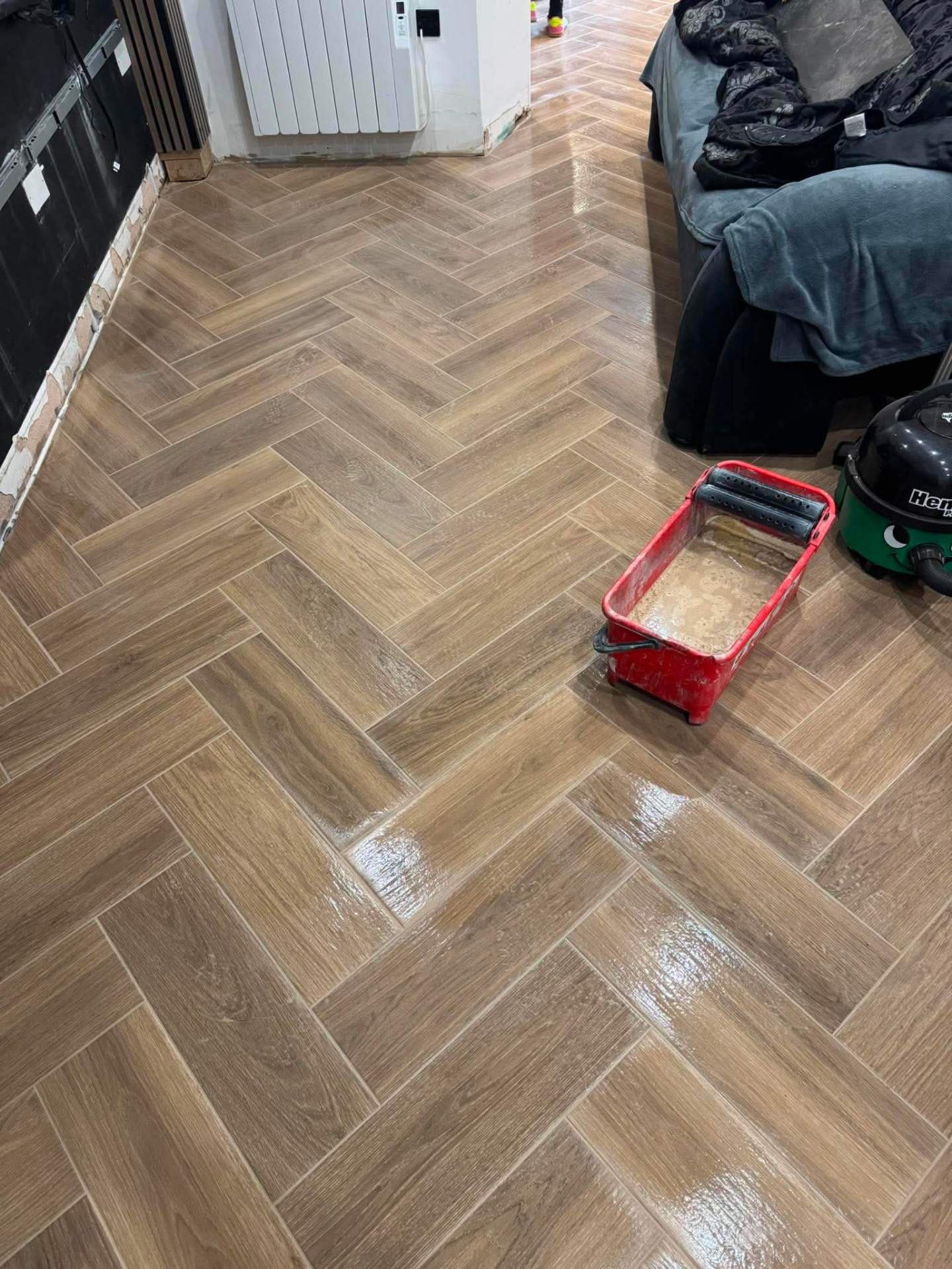 Finished herringbone in living/kitchen