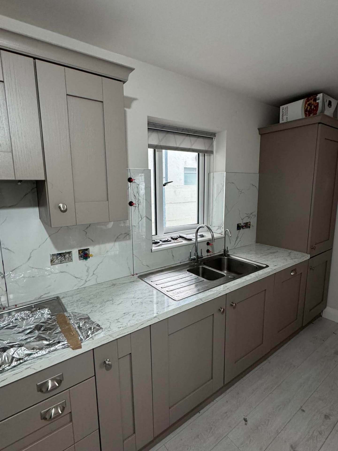 Grey shaker — long run past sink and window finished