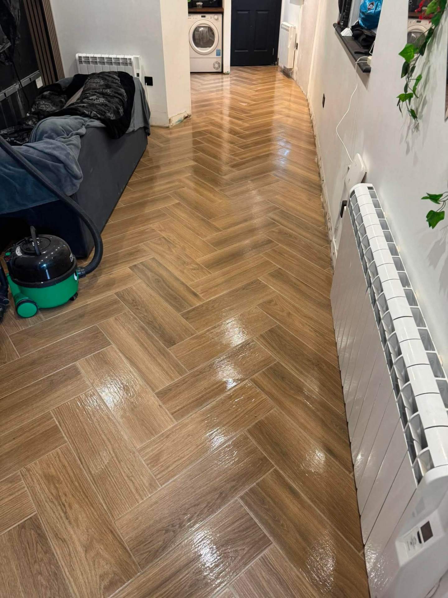 Finished herringbone — utility/hall with radiator